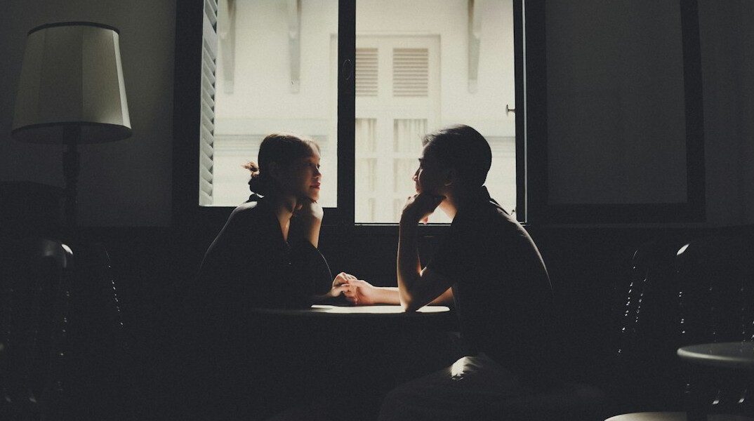 two people talking calmly