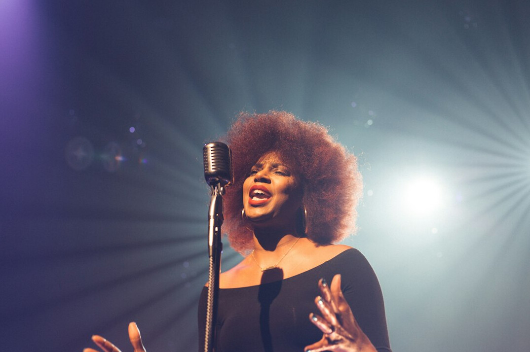 singer performing on stage